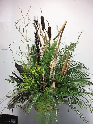 Wilderness World  arrangement $ 300.00