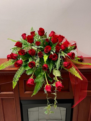 Classy roses casket Spray $ 400.00